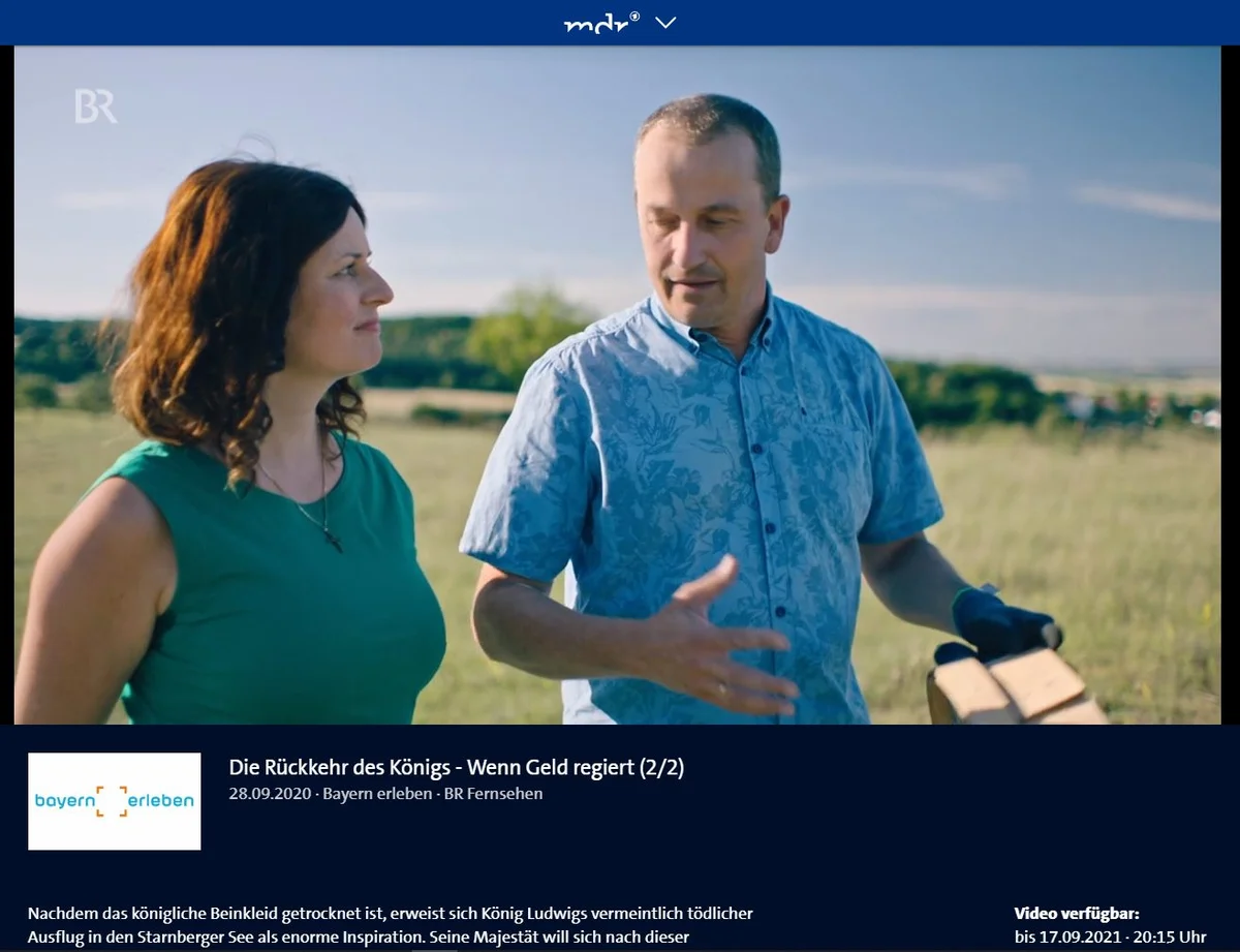 Ein Screenshot aus einem Video des MDR zeigt eine Frau und einen Mann auf einer Wiese.