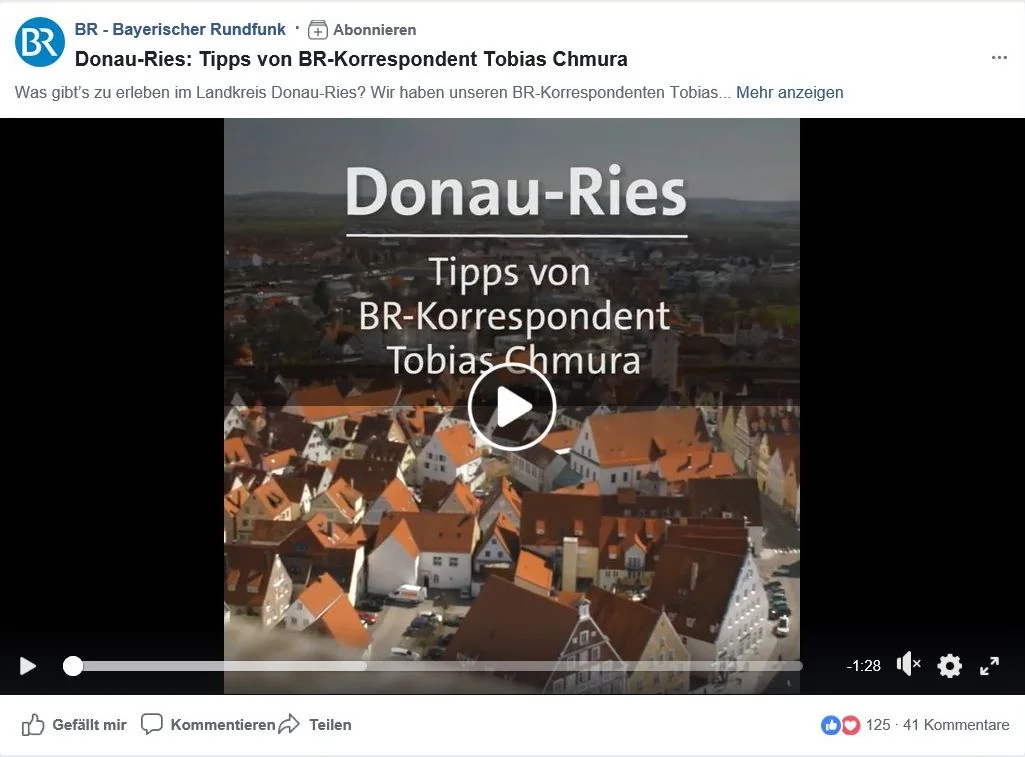 Der Screenshot aus einem Video des Bayerischen Rundfunks zeigt den Blick über die Dächer einer Stadt und den Text "Donau-Ries - Tipps vom BR-Korrespondent Tobias Chmura".